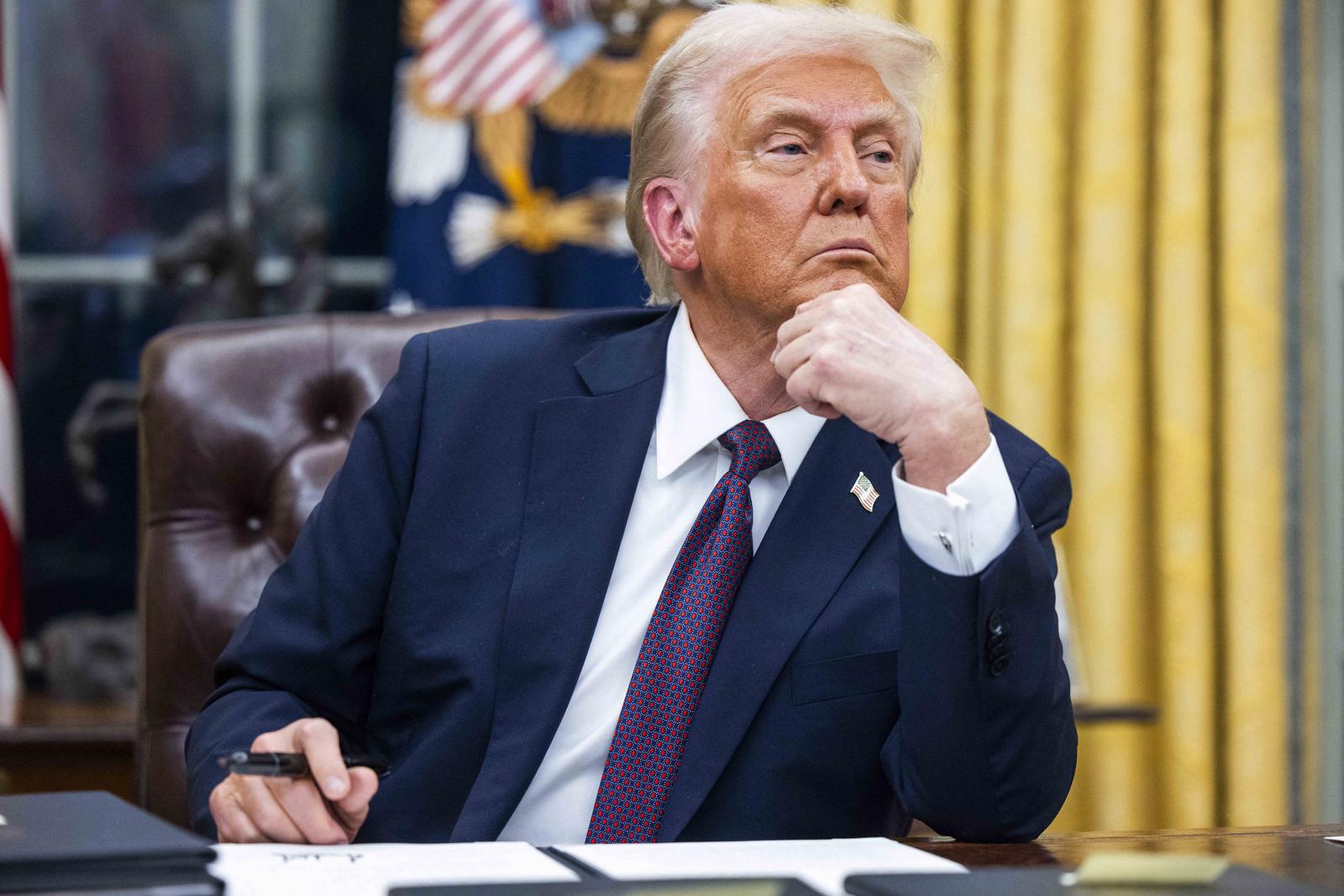 US President Donald Trump numerous executive orders, including pardons for defendants from the January 6th riots and a delay on the TikTok ban, on the first day of his presidency in the Oval Office of the White House in Washington, DC, USA, 20 January 2025. Trump, who defeated Kamala Harris to become the 47th president of the United States, was sworn in earlier in the day, though the planned outdoor ceremonies and events were cancelled due to extremely cold temperatures. Photo by Jim Lo Scalzo/Pool/ABACAPRESS.COM Photo: Pool/ABACA/ABACA