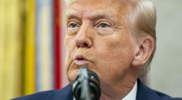 United States President Donald Trump takes questions after Alina Habba, his former defense lawyer, is sworn in as US Attorney for New Jersey in the Oval Office of the White House in Washington, DC on Friday, March 28, 2025. Credit: Bonnie Cash / Pool via CNP