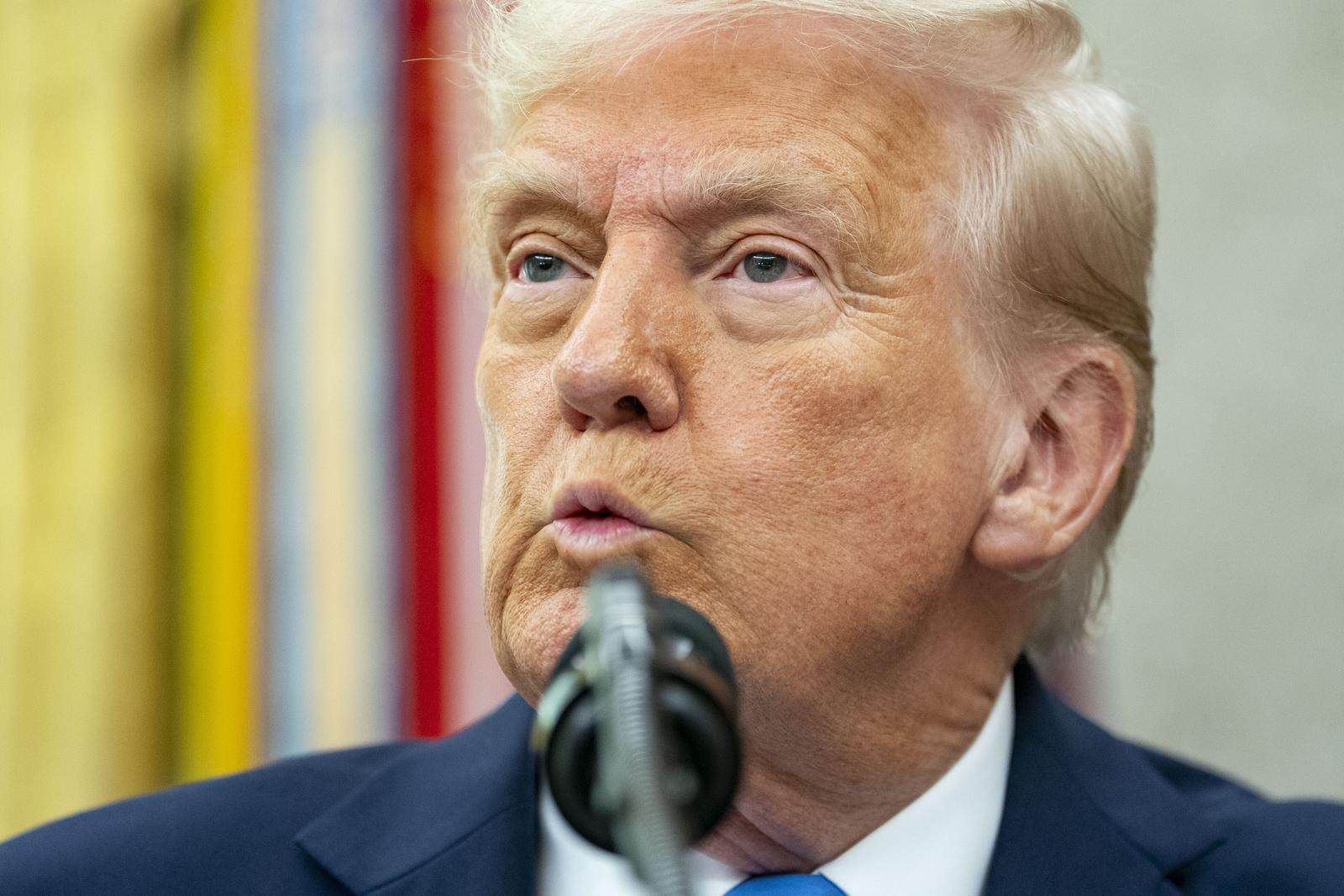 United States President Donald Trump takes questions after Alina Habba, his former defense lawyer, is sworn in as US Attorney for New Jersey in the Oval Office of the White House in Washington, DC on Friday, March 28, 2025. Credit: Bonnie Cash / Pool via CNP