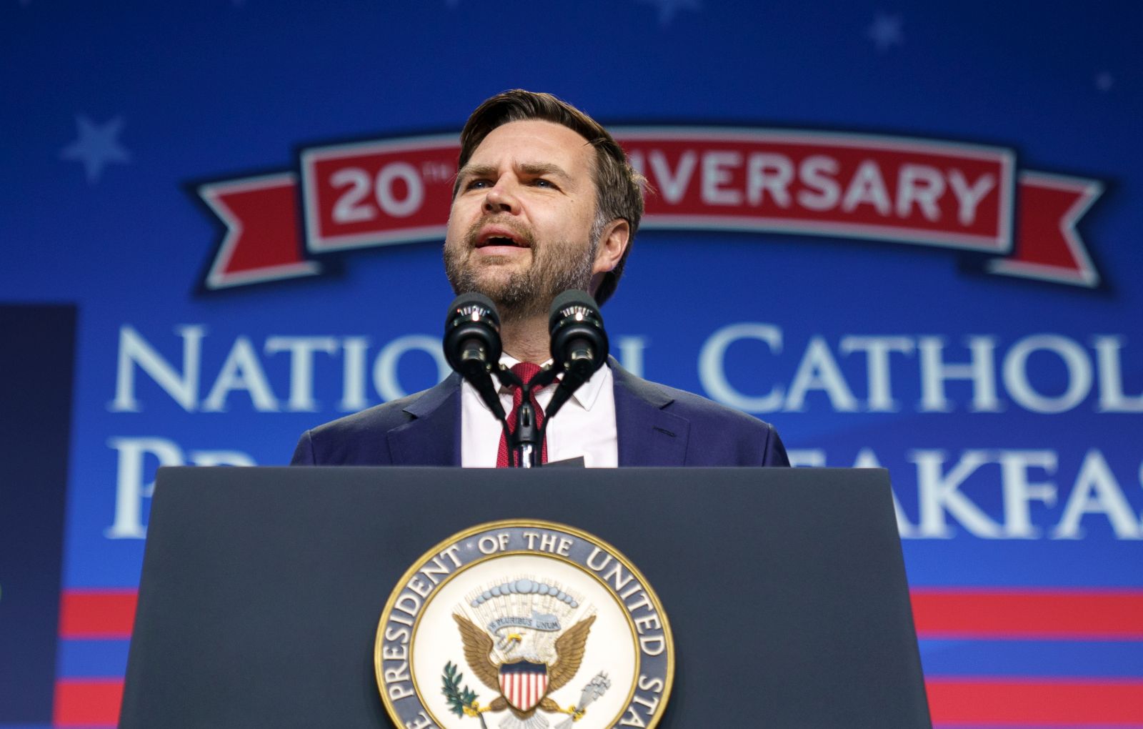 epa11930137 US Vice President JD Vance attends the National Catholic Prayer Breakfast at the Walter E. Washington Convention Center Washington, DC, USA, 28 February 2025.  EPA/WILL OLIVER / POOL
