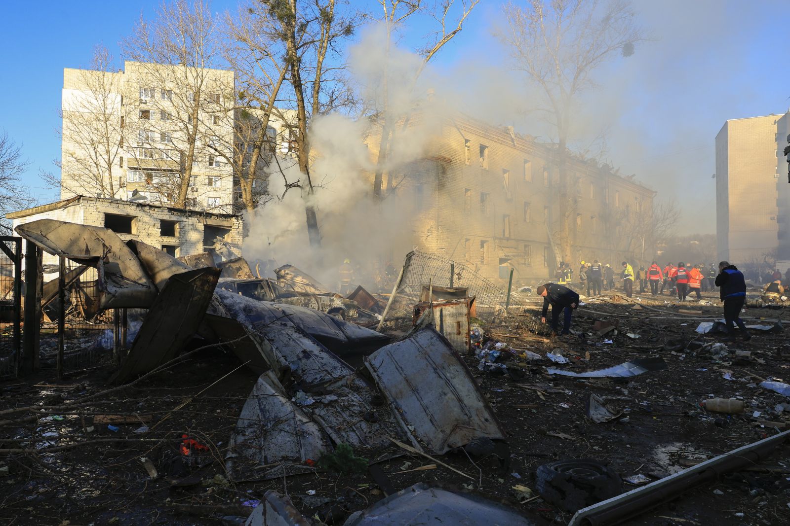 epa11946502 Ukrainian rescuers work at the site of Russian shelling near a residential building in Kharkiv, northeastern Ukraine, 07 March 2025, amid the Russian invasion. At least eight people were injured after Russian missile strikes hit near a three-story building and a critical infrastructure facility in Kharkiv, the Mayor of the city Ihor Terekhov wrote on telegram. Russia launched 194 attack drones and 67 missiles across Ukraine overnight, with Ukrainian air defenses shooting down 36 rockets and 186 drones, according to the Air Force Command of Ukraine.  EPA/SERGEY KOZLOV