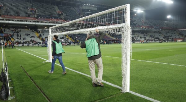 epa11950150 Workers collect the goal nets due to the suspension of the Spanish LaLiga soccer match between FC Barcelona and CA Osasuna, at the Estadi Olimpic Lluis Companys, in Barcelona, Spain, 08 March 2025. The match suspended shortly before kick off due to the death of Barcelona first team doctor Carles Minarro Garcia.  EPA/Toni Albir