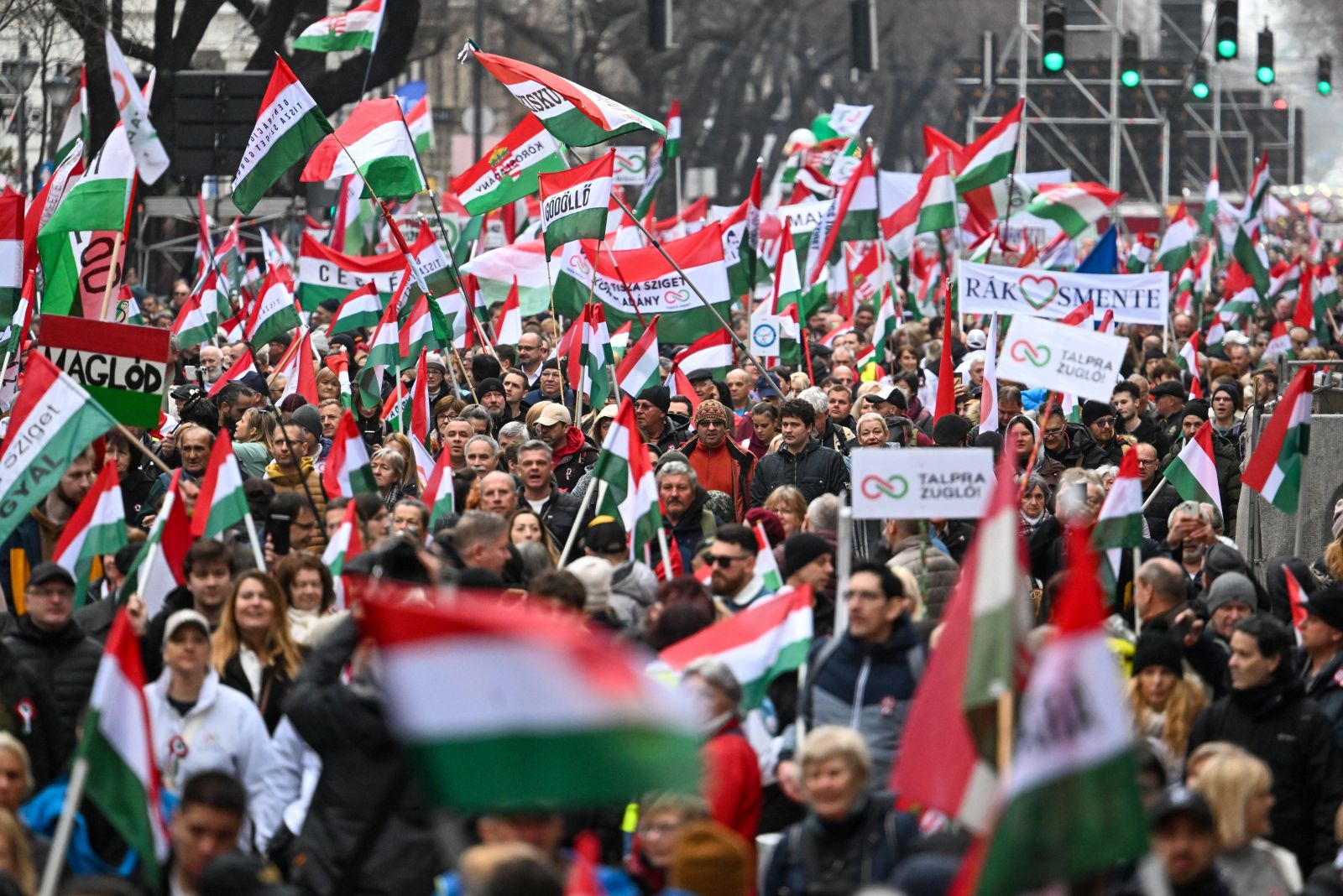 epa11966681 Participants attend the celebration organised by the Hungarian opposition Tisza Party to commemorate the 177th anniversary of the outbreak of the 1848 revolution and war of independence against Habsburg rule, in Andrassy Avenue in Budapest, Hungary, 15 March 2025.  EPA/Tibor Illyes HUNGARY OUT