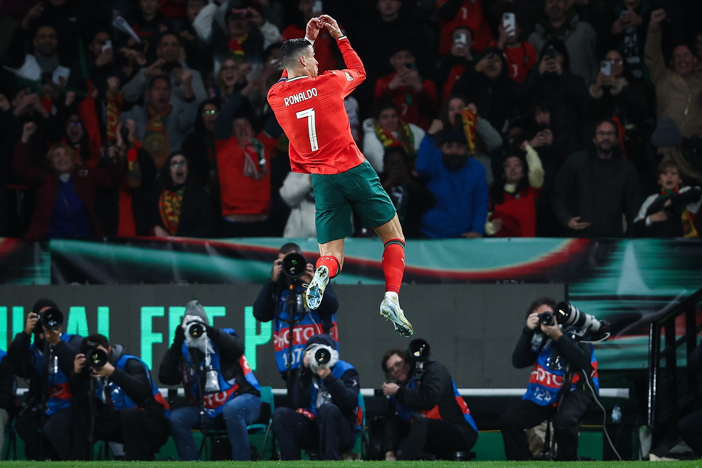 epa11984325 Portugal's Cristiano Ronaldo celebrates scoring a goal during the UEFA Nations League playoff second leg soccer match between Portugal and Denmark at Alvalade Stadium, in Lisbon, Portugal, 23 March 2025.  EPA/RODRIGO ANTUNES