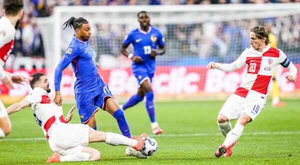 Michael OLISE of France and Luka MODRIC of Croatia during the UEFA Nations League 2024/2025 match between France and Croatia at Stade de France on March 23, 2025 in Paris, France. (Photo by Daniel Derajinski/Icon Sport) Photo: Icon Sport/ICON SPORT