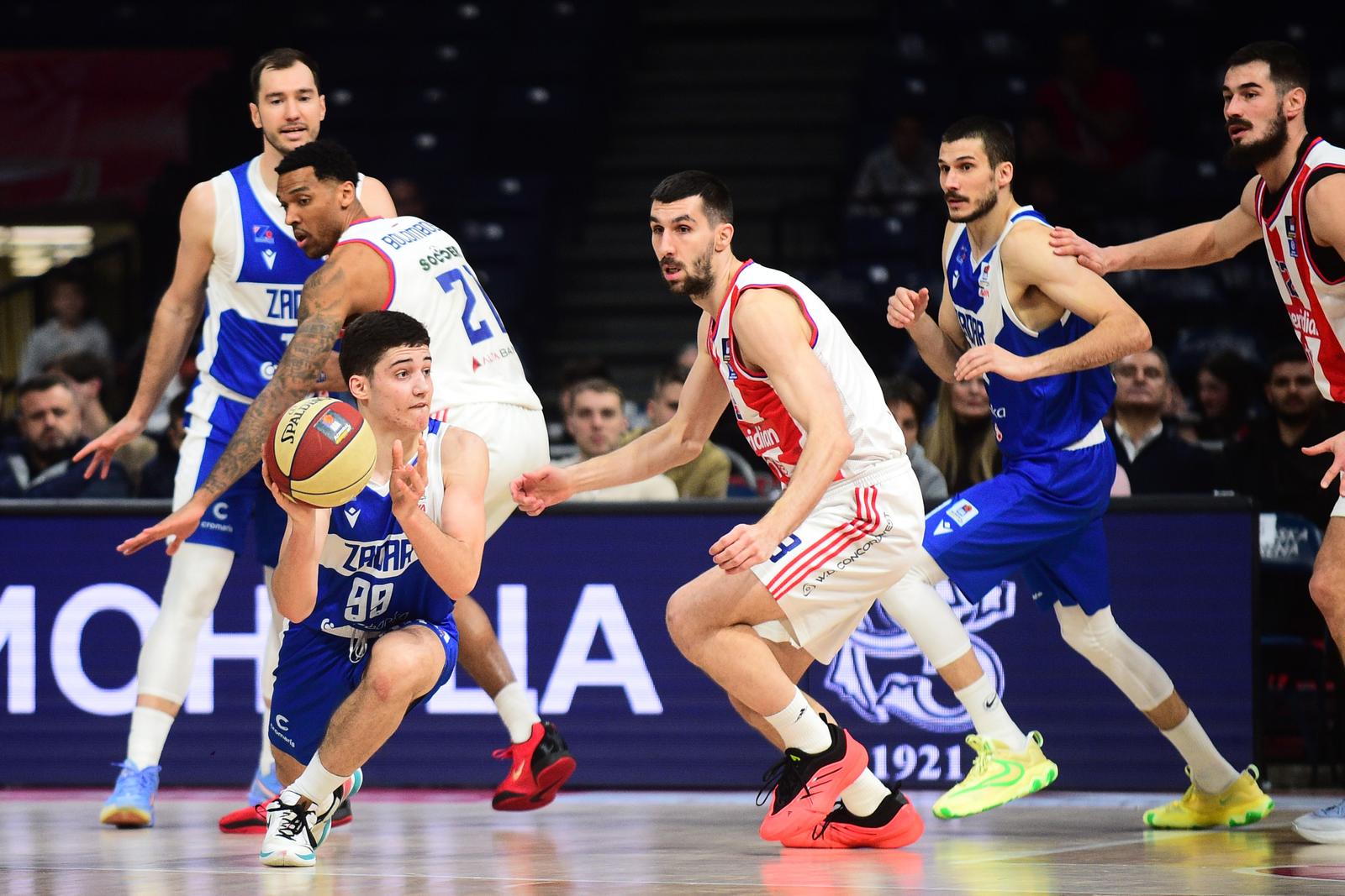 02, March, 2025, Belgrade - The match of the 21st round of the AdmiralBet ABA League between KK Crvena zvezda MeridianBet and KK Zadar was played at the Belgrade Arena. Toni Torbarina, #99 (KK Zadar), Ognjen Dobric, #13 (KK Crvena zvezda MeridianBet). Photo: Dusan Milenkovic/ATAImages

02, mart, 2025, Beograd - Utakmica 21. kola AdmiralBet ABA League izmedju KK Crvena zvezda MeridianBet i KK Zadar odigrana je u Beogradskoj Areni. Photo: Dusan Milenkovic/ATAImages Photo: Dusan Milenkovic/ATAImages/PIXSELL
