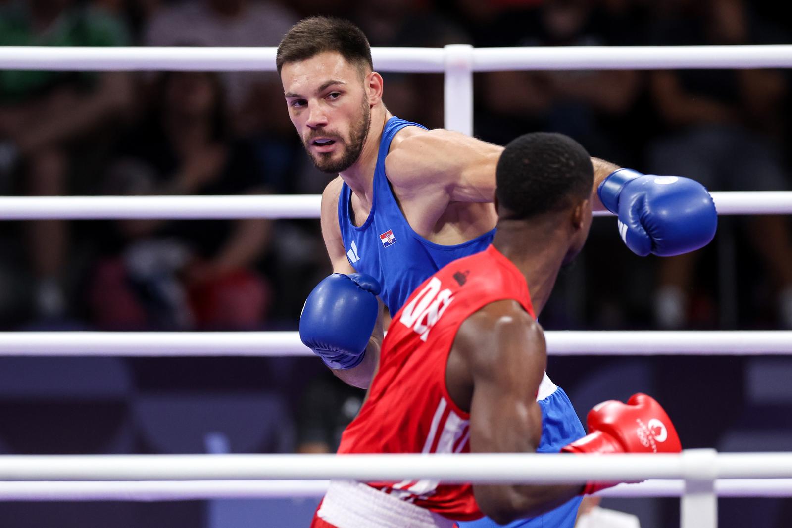 02.08.2024., Pariz, Francuska - XXXIII. Olimpijske igre Pariz 2024. Boks, cetvrtfinale muskarci -80kg, Gabrijel Veocic, Hrvatska - Cristian Javier Pinales, Diminikanska Republika. Photo: Igor Kralj/PIXSELL