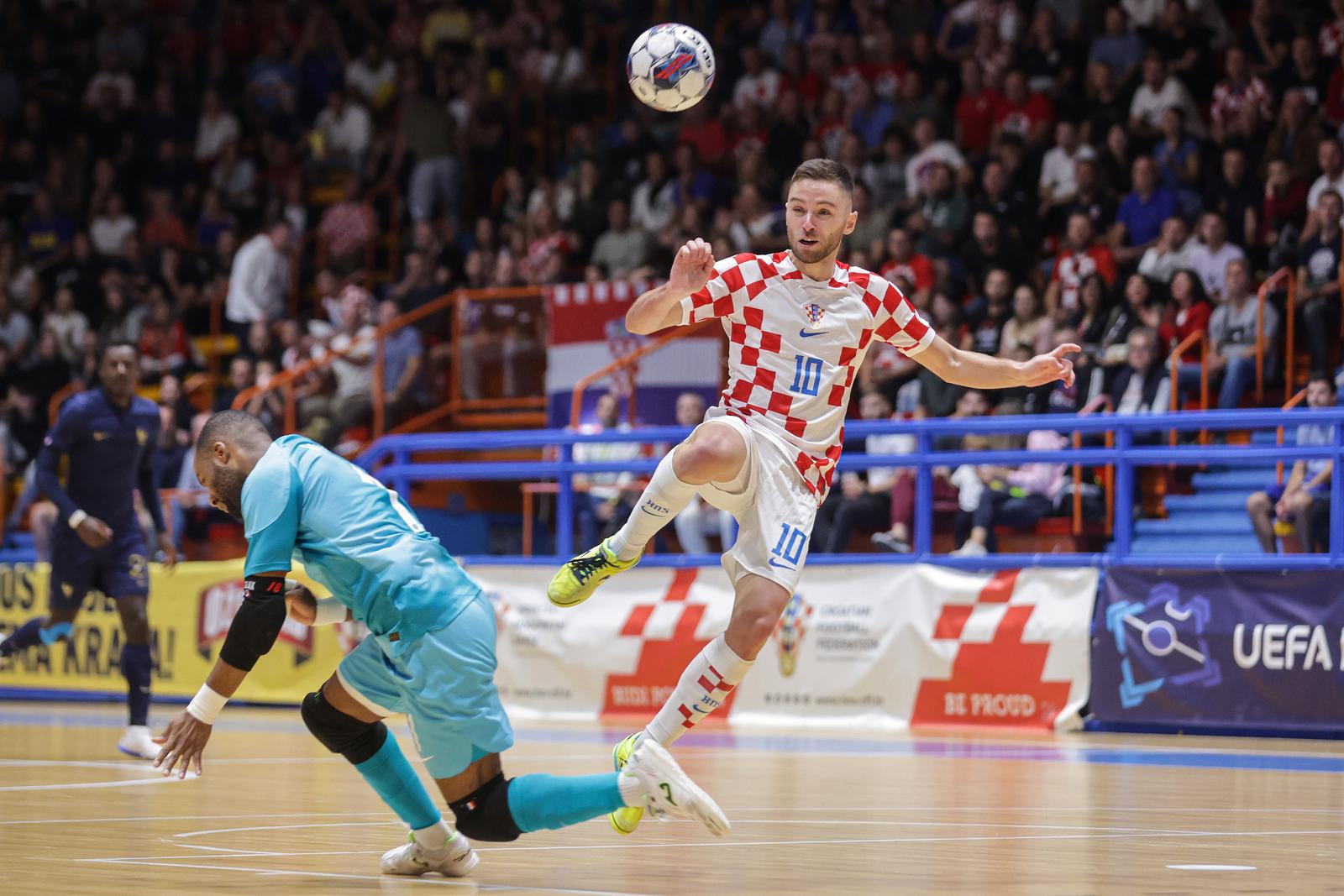 10.10.2023., Dom sportova, Zagreb - Elitno kolo kvalifikacija za FIFA Svjetsko prvenstvo u futsalu, skupina C, Hrvatska - Francuska. Josip Jurlina, Francis Lokoka. Photo: Luka Stanzl/PIXSELL