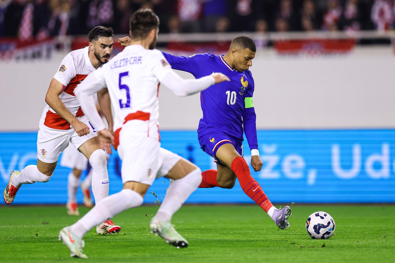 20.03.2025., stadion Poljud - UEFA Liga nacija, cetvrtfinale, prva utakmica, Hrvatska - Francuska. Josip Sutalo i Kylian Mbappe Photo: Igor Kralj/PIXSELL
