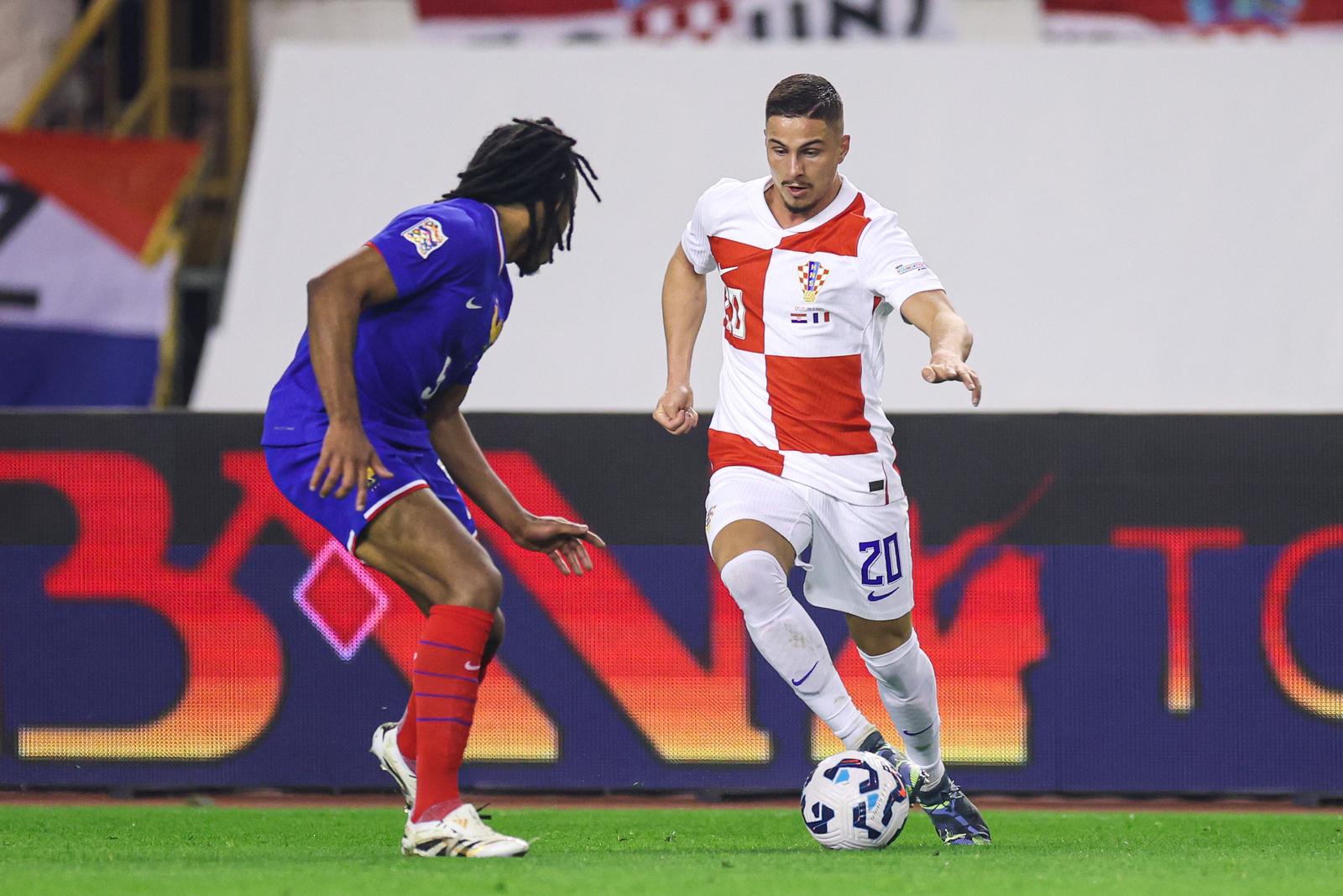 20.03.2025., stadion Poljud - UEFA Liga nacija, cetvrtfinale, prva utakmica, Hrvatska - Francuska. Jules Kounde, Franjo Ivanovic Photo: Igor Kralj/PIXSELL