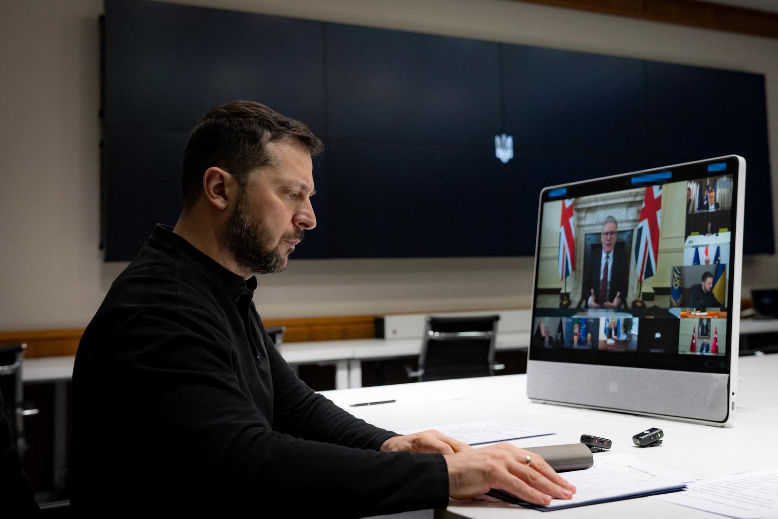 Handout photo shows Ukrainian President Volodymyr Zelensky, listens to the UK’s Prime Minister Sir Keir Starmer and several international leaders during video conference meeting for peace and security in Ukraine organised by Mr Keir Starmer, in Kyiv, Ukraine, on March 15, 2025. Photo by Ukrainian Presidency via ABACAPRESS.COM Photo: ABACA/ABACA