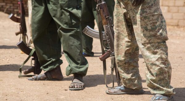 Fighters of the SPLA-N stand on a dusty road wearing sandals and holding Kalashnikov assualt rifles in Heiban, Sudan, 12 February 2017. The Nuba mountains are held by the Sudanese Liberation Army and their political branch (SPLM-N). Photo: Laura Wagenknecht/dpa /DPA/PIXSELL