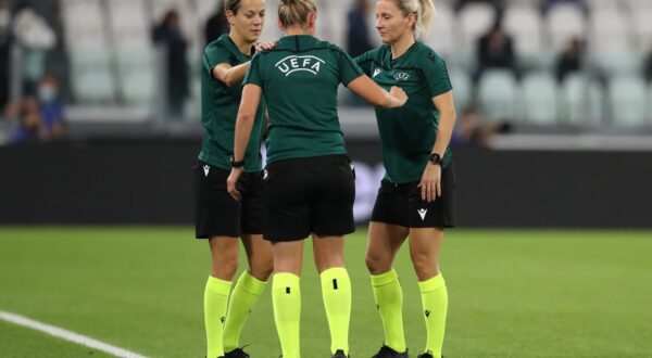 October 13, 2021, Turin, United Kingdom: Turin, Italy, 13th October 2021. The referee Ivana Martincic of Croatia stretches with her Assistants Sanja Rodak Karsic ( right ) and Maja Petravic ( centre ) during the warm up prior to the UEFA Womens Champions League match at Juventus Stadium, Turin. Picture credit should read: Jonathan Moscrop / Sportimage Photo via Newscom Photo: Jonathan Moscrop/NEWSCOM