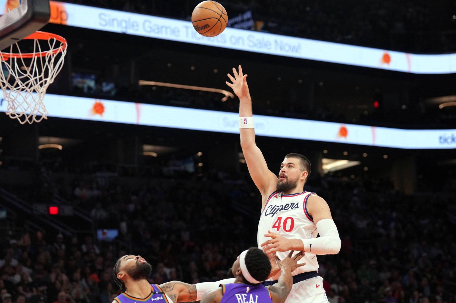Mar 4, 2025; Phoenix, Arizona, USA; LA Clippers center Ivica Zubac (40) shoots against the Phoenix Suns during the first half at PHX Center. Mandatory Credit: Joe Camporeale-Imagn Images Photo: Joe Camporeale/REUTERS