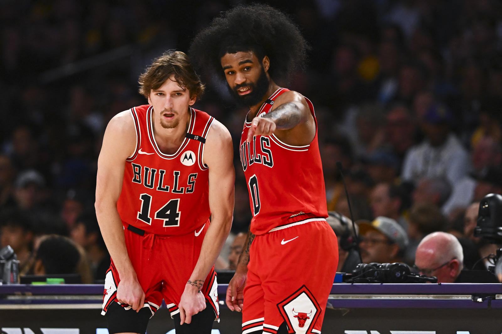 Mar 22, 2025; Los Angeles, California, USA; Chicago Bulls guard Coby White (0) points with Chicago Bulls forward Matas Buzelis (14) against the Los Angeles Lakers during the second half at Crypto.com Arena. Mandatory Credit: Jonathan Hui-Imagn Images Photo: Jonathan Hui/REUTERS