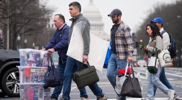 Feb 27, 2025; Washington, DC, USA; USAID workers depart after removing their belongings from the agency's headquarters in Washington, D.C., on Feb. 27, 2025. With the exception of critical staff, the Trump administration is placing all personnel at USAID on paid administrative leave and eliminating 1, 600 positions in the United States. Mandatory Credit: Jack Gruber-USA TODAY ORG XMIT: USAT-1032581 (Via OlyDrop) (Photo by Jack Gruber, Jack Gruber / USA TODAY NETWORK via Imagn Images/Sipa USA) Photo: USA TODAY/SIPA USA