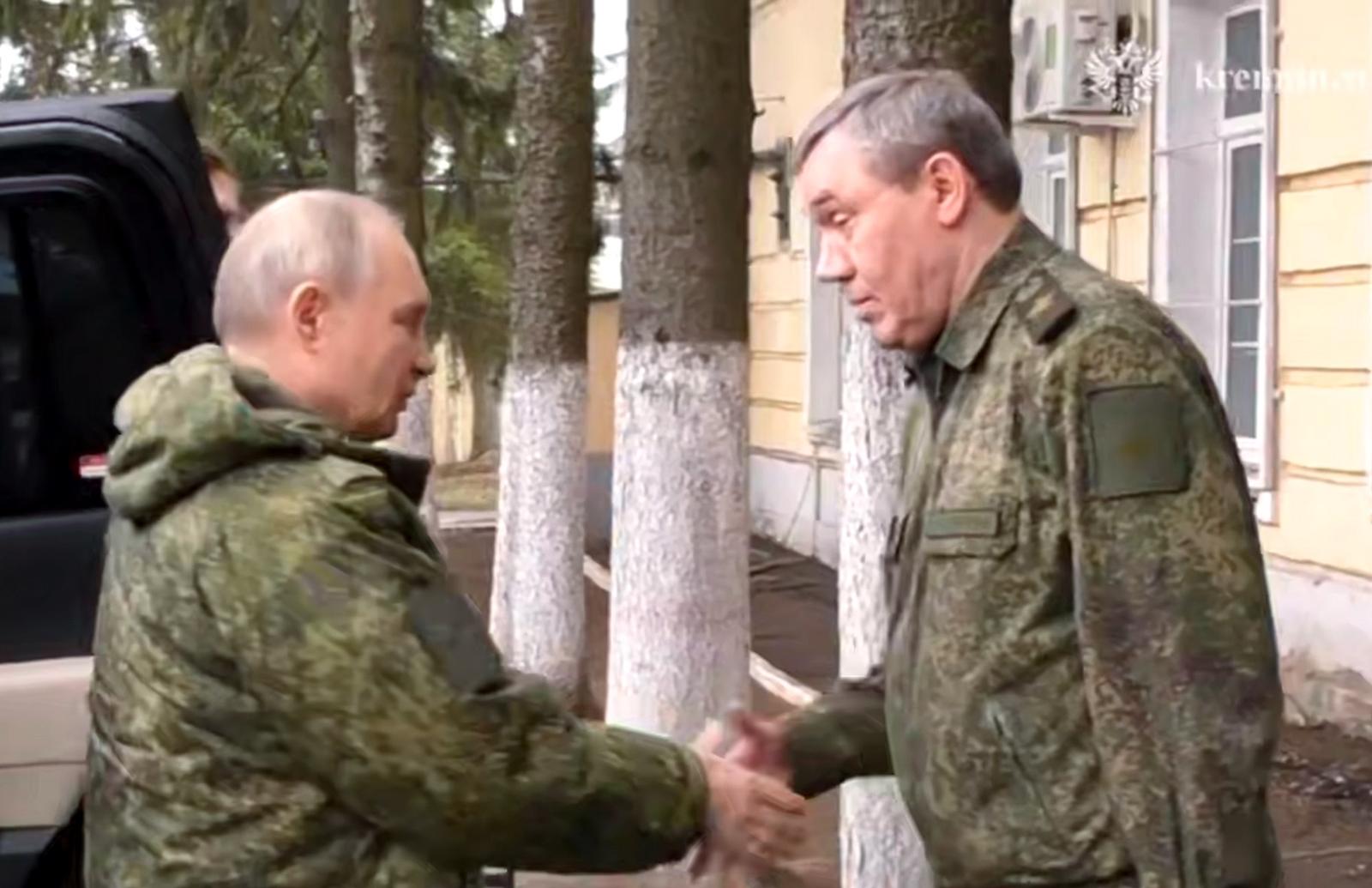 MARCH 12, 2025: Seen in this video screen grab are Russias President Vladimir Putin (L) and The Chief of the General Staff of the Armed Forces of Russia, Commander of Russia's Joint Forces in the zone of Russia's special military operation Valery Gerasimov shaking hands during President Putin's visit to a command post of the Russian Army Kursk Force. Video grab. Best possible quality. Kremlin Press Office/TASS/Sipa USA Photo: Tass/SIPA USA