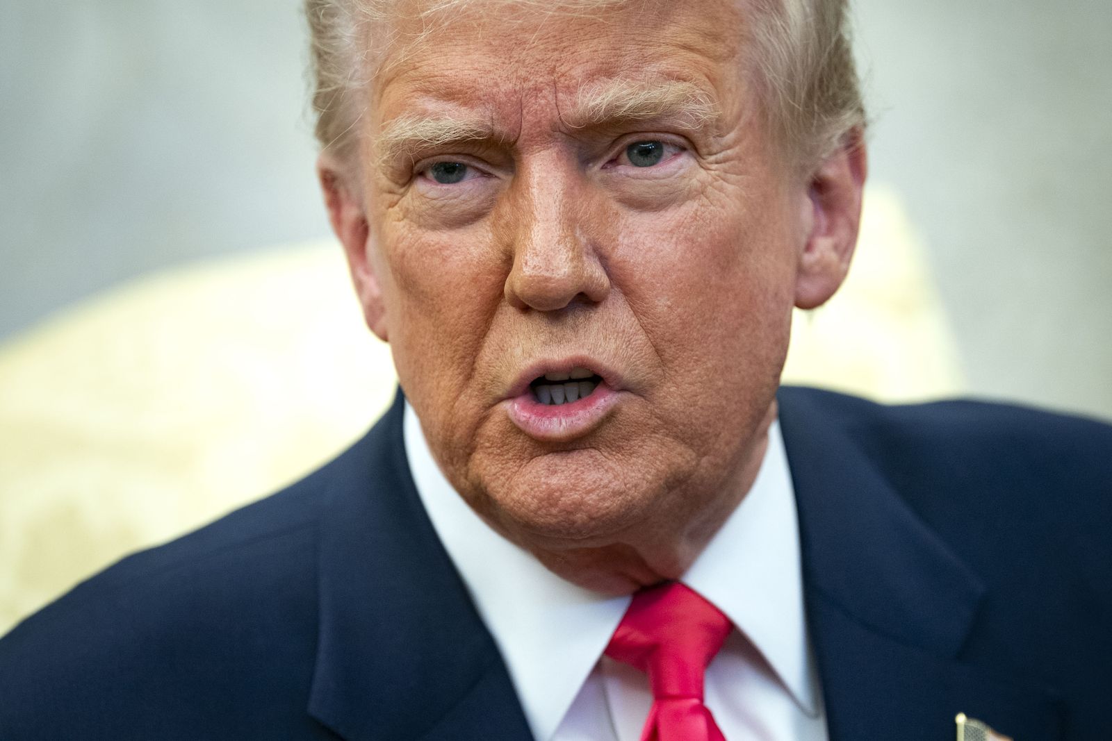 epa11958886 US President Donald Trump speaks during a meeting with Taoiseach of Ireland Micheal Martin in the Oval Office at the White House in Washington, DC, USA, 12 March 2025.  EPA/BONNIE CASH / POOL