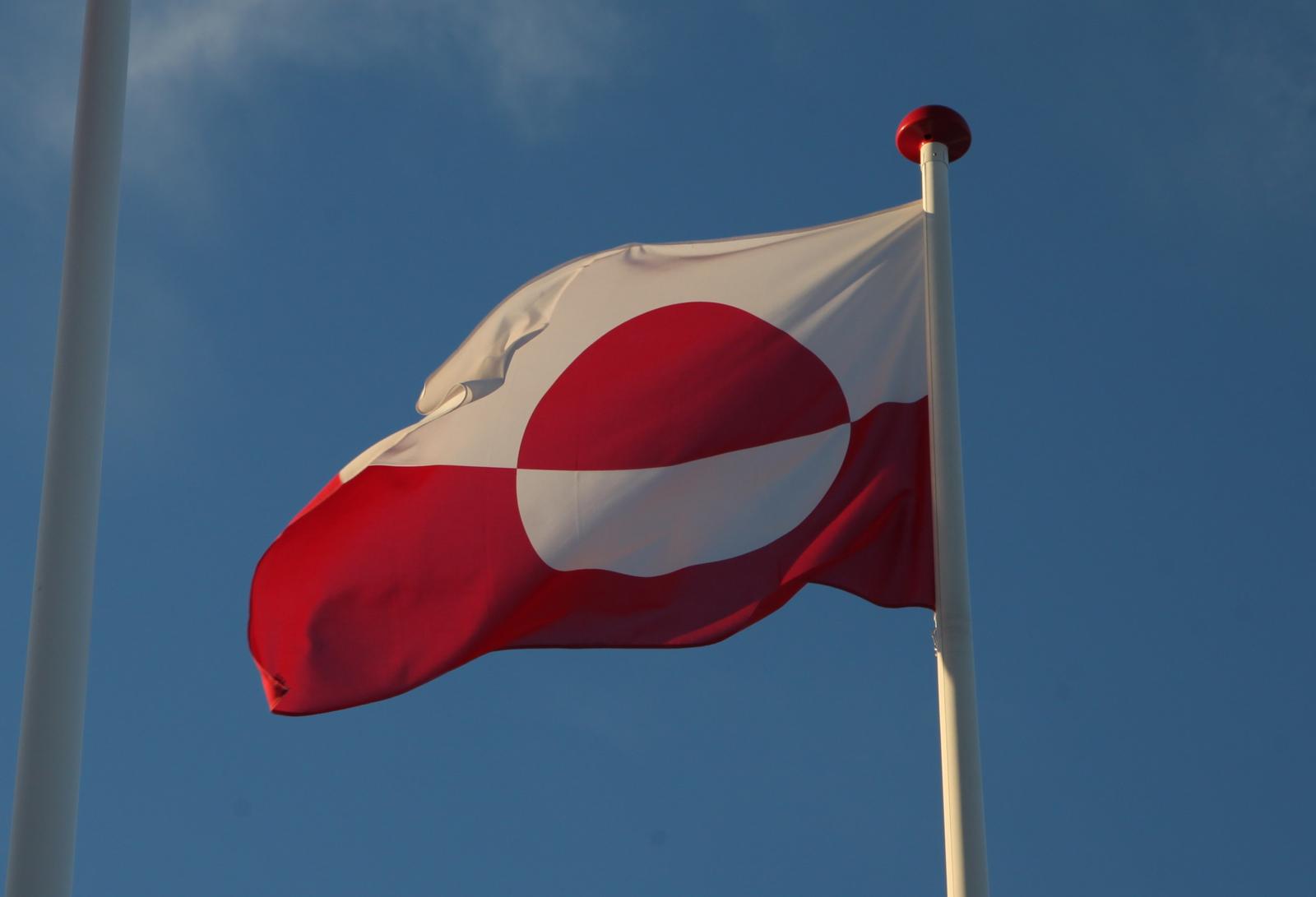 04 February 2025, Greenland, Nuuk: A Greenlandic flag flies in front of the island's parliament, the Inatsisartut. Greenland elects a new parliament on March 11. Photo: Steffen Trumpf/dpa Photo: Steffen Trumpf/DPA