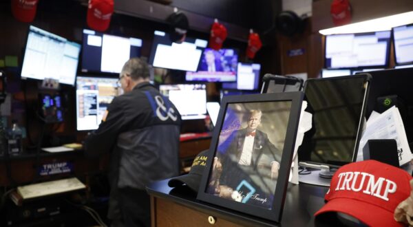 Trump Maga merchandise is present on the floor of the New York Stock Exchange as traders work on Wall Street on Thursday, April 3, 2025 in New York City. The Dow Jones Industrial Average opened today down over 1000 points as US stocks continue to be volatile due to trade-war worries from President Trump's tariffs. President Donald Trump signed an aggressive and far-reaching "reciprocal tariff" policy at the White House yesterday. Photo by John Angelillo/UPI Photo via Newscom Photo: John Angelillo/NEWSCOM