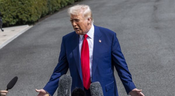 epa12008121 US President Donald Trump responds to a question from the media as he walks to board Marine One on the South Lawn of the White House in Washington, DC, USA, 03 April 2025. President Trump is traveling to Florida for the weekend.  EPA/SHAWN THEW