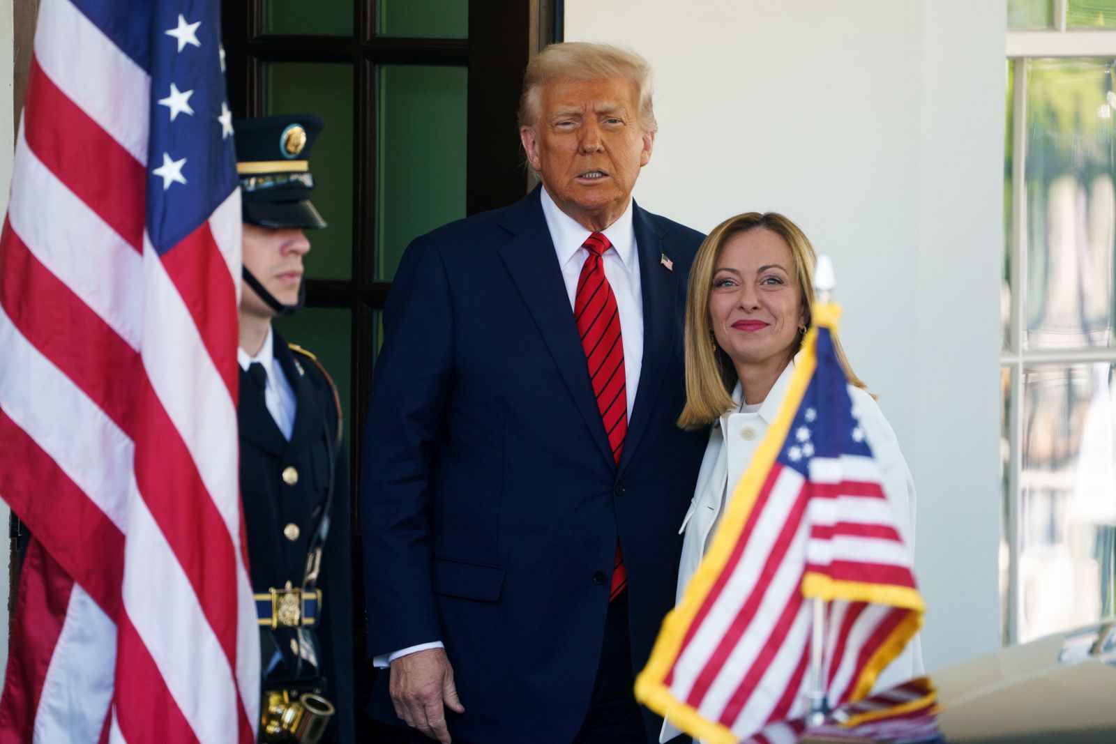 epa12037062 US President Donald Trump (L) greets Italian Prime Minister Giorgia Meloni (R) at the White House, Washington, DC, USA, 17 April 2025.  EPA/WILL OLIVER