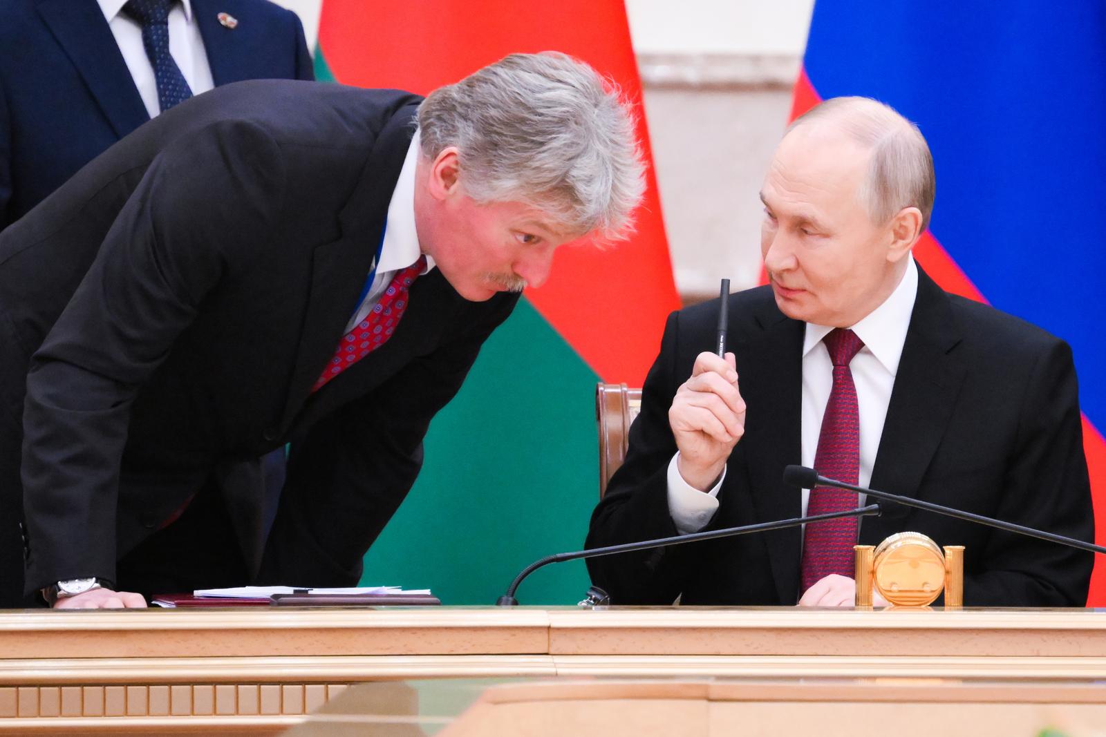 BELARUS, MINSK - DECEMBER 6, 2024: Russia's President Vladimir Putin (R) talks to his Press Secretary Dmitry Peskov during a meeting of the Supreme State Council of the Union State of Russia and Belarus. Grigory Sysoyev/POOL/TASS/Sipa USA Photo: Tass/SIPA USA