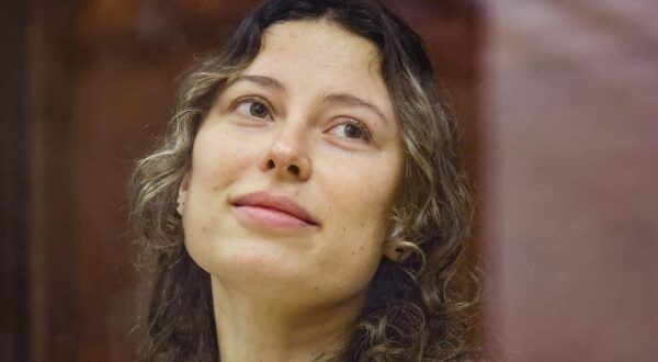 RUSSIA, YEKATERINBURG - AUGUST 15, 2024: Russian-US citizen Ksenia Karelina attends a hearing into her treason case at the Sverdlovsk Regional Court. Donat Sorokin/TASS/Sipa USA Photo: Tass/SIPA USA
