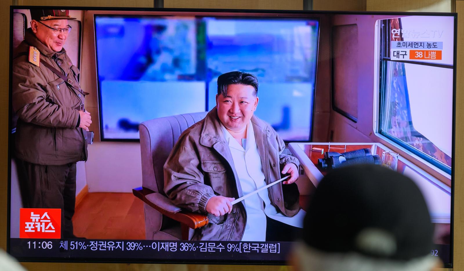 A 24-hour Yonhap news TV broadcast at Seoul Railway Station showing a news broadcast with the North Korean leader Kim Jong Un smiling after a test-fire of the latest surface-to-air missile(SAM) at an undisclosed location in North Korea. North Korea has successfully test-fired its latest surface-to-air missile(SAM) system, which was recently put into full-scale production, as leader Kim Jong Un oversaw the test, state media reported on March 21. The test-firing was conducted by the country's Missile Administration on Thursday to "examine the comprehensive performance" of the missile system being mass-produced at a munitions' industry enterprise, the Korean Central News Agency (KCNA) noted.  Kim oversaw the test alongside key members of the party's Central Military Commission, the KCNA said, claiming that it proved the anti-aircraft missile's combat fast response is "advantageous" and "highly reliable." (Photo by Kim Jae-Hwan / SOPA Images/Sipa USA) Photo: SOPA Images/SIPA USA