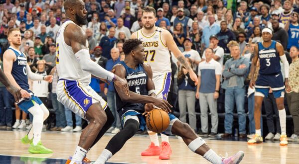 Apr 27, 2025; Minneapolis, Minnesota, USA; Minnesota Timberwolves guard Anthony Edwards (5) is fouled by Los Angeles Lakers forward LeBron James (23) in the fourth quarter during game four of first round for the 2025 NBA Playoffs at Target Center. Mandatory Credit: Matt Blewett-Imagn Images/Sipa USA Photo: Imagn Images/SIPA USA