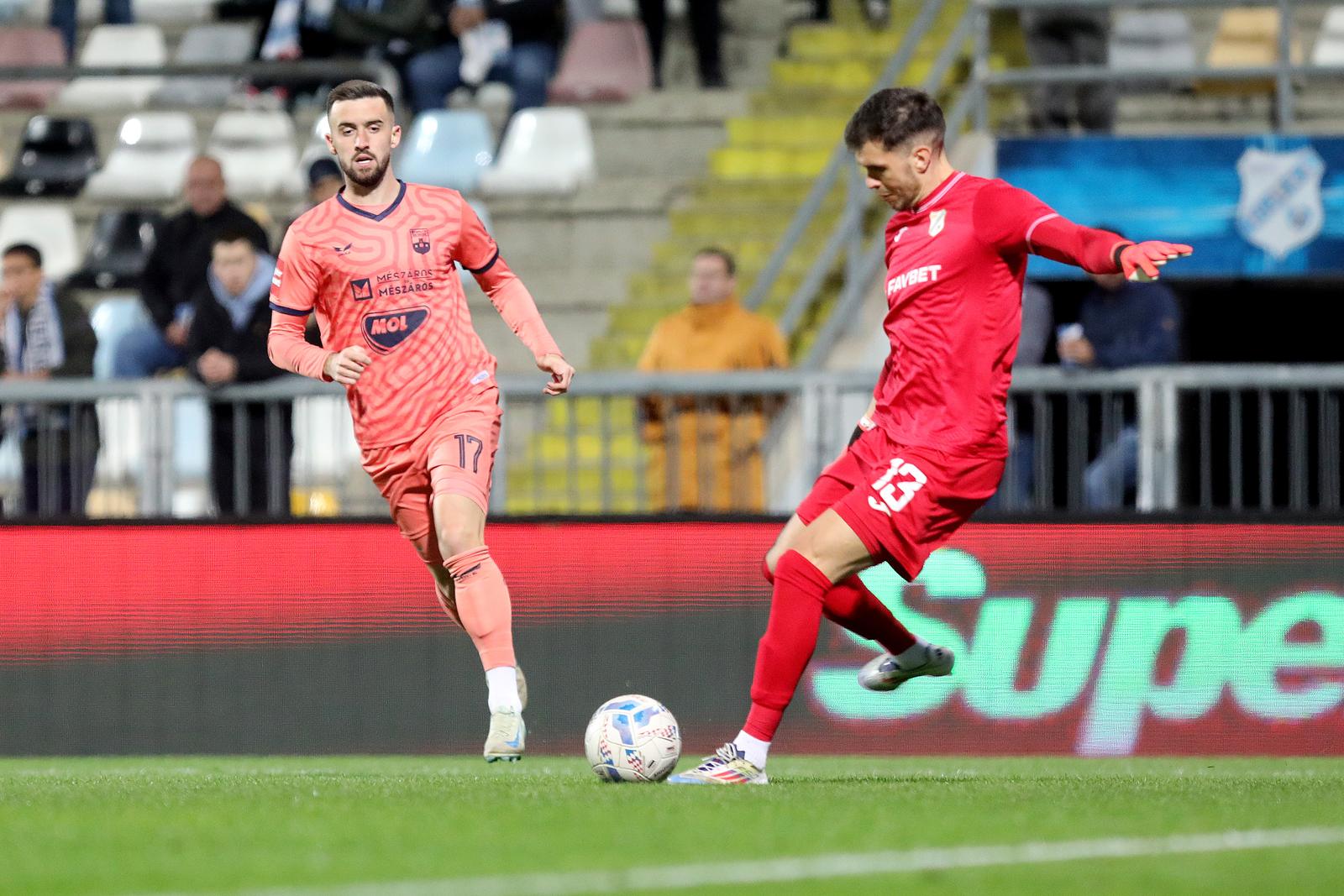 10.11.2024., stadion Rujevica, Rijeka - 13. kolo SuperSport HNL-a: HNK Rijeka - NK Osijek. Martin Zlomislic, Arnel Jakupovic. Photo: Goran Kovacic/PIXSELL