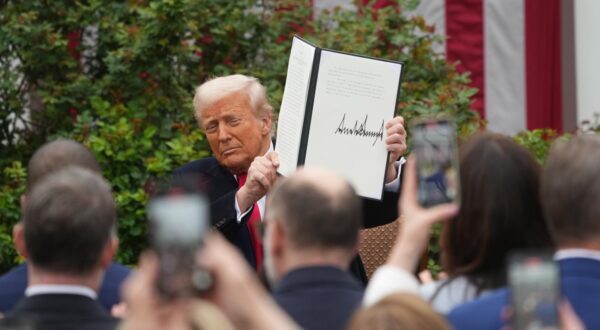 United States President Donald J Trump displays the signed Executive Order after concluding his remarks during a “Make America Wealthy Again” event in the Rose Garden of the White House in Washington, DC on Wednesday, April 2, 2025.  The President has called this day “Liberation Day” as he announces a set of “reciprocal tariffs” in response to alleged years of unfair trade practices by other nations.
Credit: Chris Kleponis / CNP/AdMedia Photo: CNP/AdMedia/NEWSCOM