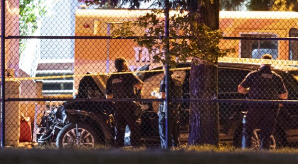 Vancouver Police look over a black car believed to be involved in an incident where a vehicle drove into a crowd at the Lapu Lapu Festival in Vancouver on Saturday April 26, 2025. THE CANADIAN PRESS/Rich Lam Photo: Rich Lam/PRESS ASSOCIATION