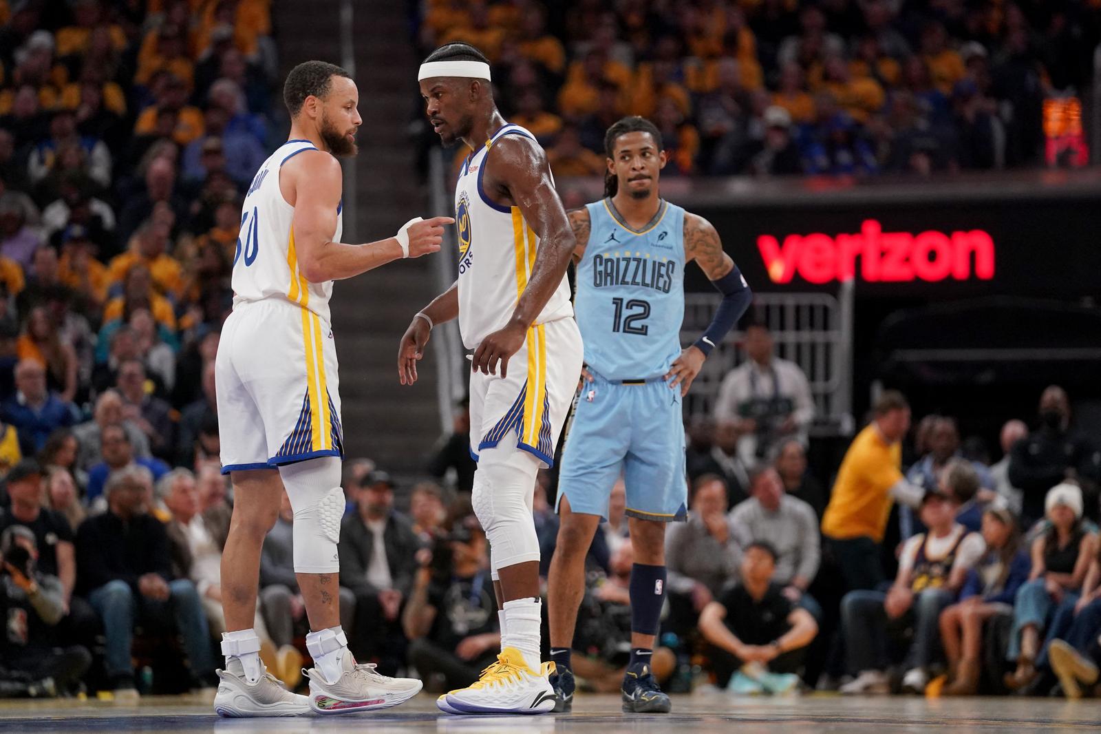 Apr 15, 2025; San Francisco, California, USA; Golden State Warriors guard Stephen Curry (30) talks with forward Jimmy Butler III (10) during a break in the action against the Memphis Grizzlies in the second quarter at the Chase Center. Mandatory Credit: Cary Edmondson-Imagn Images Photo: Cary Edmondson/REUTERS