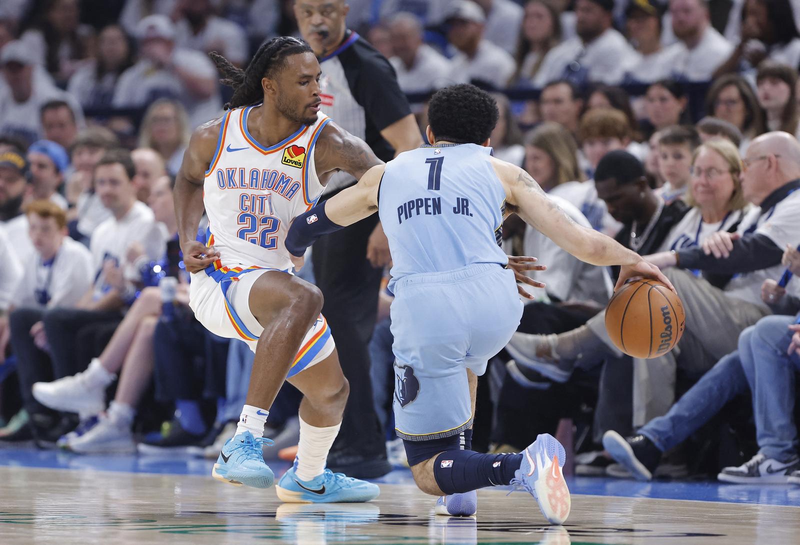 Apr 20, 2025; Oklahoma City, Oklahoma, USA; Oklahoma City Thunder guard Cason Wallace (22) defends a drive by Memphis Grizzlies guard Scotty Pippen Jr. (1) during the second quarter at Paycom Center. Mandatory Credit: Alonzo Adams-Imagn Images Photo: Alonzo Adams/REUTERS