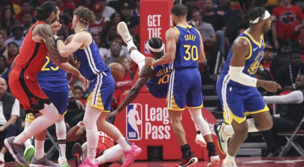 Apr 23, 2025; Houston, Texas, USA; Golden State Warriors forward Jimmy Butler III (10) falls to the floor and suffers an apparent injury during the first quarter during game two of the first round for the 2024 NBA Playoffs against the Houston Rockets at Toyota Center. Mandatory Credit: Troy Taormina-Imagn Images Photo: Troy Taormina/REUTERS