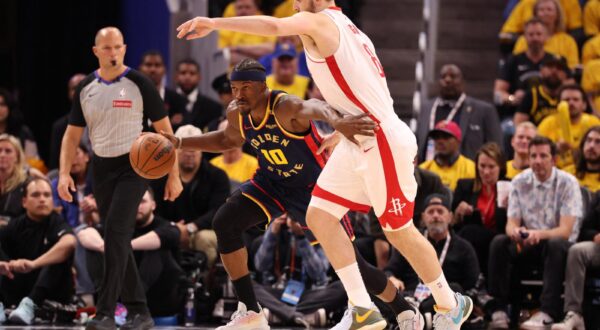 Apr 28, 2025; San Francisco, California, USA; Golden State Warriors forward Jimmy Butler III (10) controls the ball against Houston Rockets center Alperen Sengun (28) during the third quarter of game four of the 2025 NBA Playoffs first round at Chase Center. Mandatory Credit: Kelley L Cox-Imagn Images Photo: Kelley L Cox/REUTERS