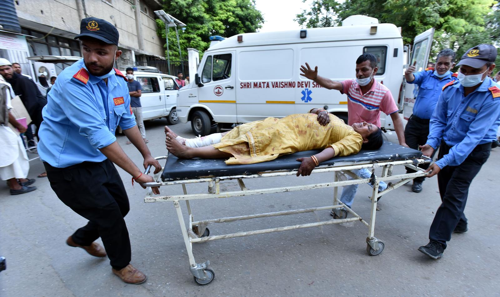 (220513) -- JAMMU, May 13, 2022 (Xinhua) -- An injured passenger is wheeled to a hospital for treatment in Jammu, the winter capital of Indian-Controlled Kashmir, on May 13, 2022. At least four pilgrims were killed and 24 others suffered burns on Friday after a bus carrying them caught fire in Indian-controlled Kashmir, police said. (Str/Xinhua) Photo: Nitin kanotra/XINHUA