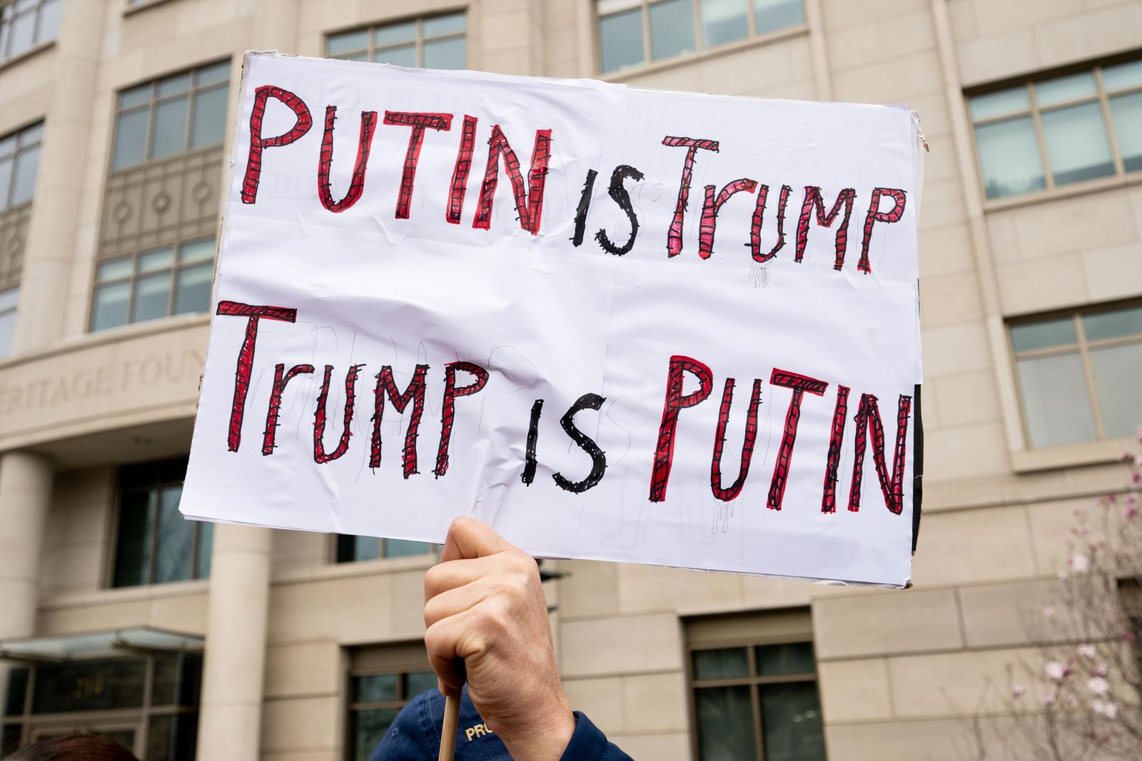A sign saying "Putin is Trump, Trump is Putin" at a demonstration against the Heritage Foundation, Project 2025, President Trump, and Elon Musk at the Heritage Foundation building in Washington, D.C. (Photo by Michael Brochstein/Sipa USA) Photo: Michael Brochstein/SIPA USA