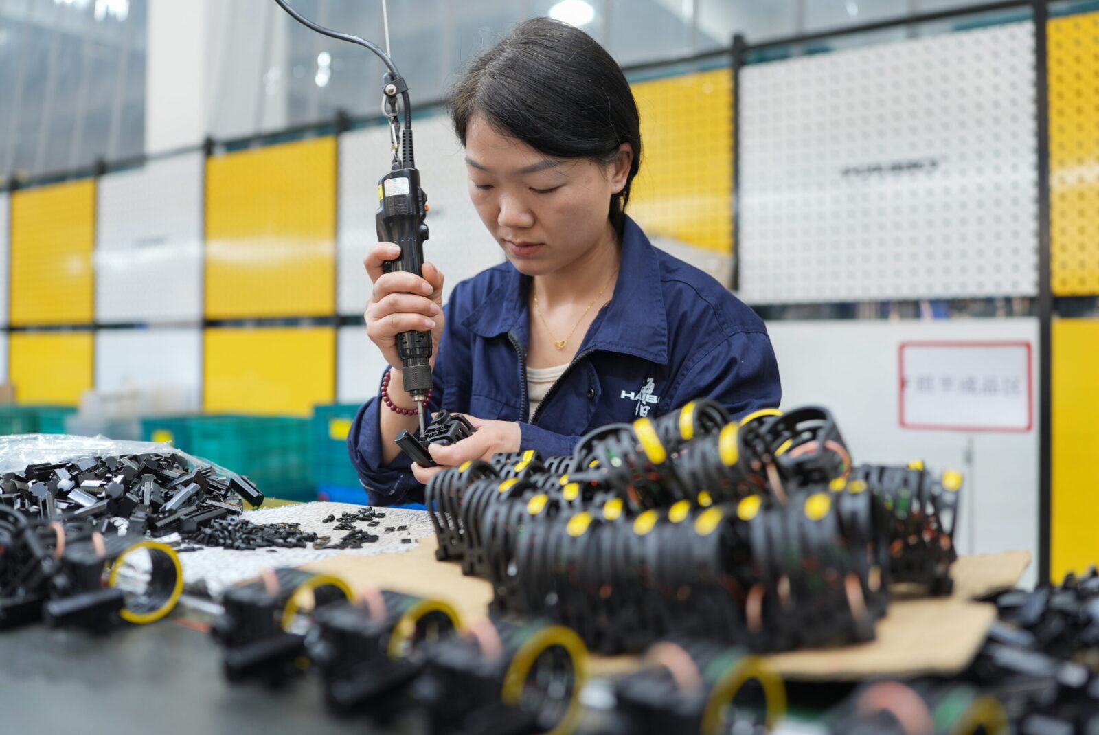 epa12022998 A staff member works at a workshop of a precision machinery manufacturing company in Beilun District of Ningbo City, east China's Zhejiang Province, 10 April 2025. In recent years, Beilun District has tailored its development plans for key industrial chains, continuously enhancing the level of digital transformation among enterprises in the region, aiming to develop a number of advantageous industrial clusters and leading enterprises. In 2024, the total output value of industrial enterprises above designated size in Beilun District achieved 585.727 billion yuan (about 80.1 billion US dollar), marking a year on year increase of 9.6 percent.  EPA/XINHUA / HUANG ZONGZHI CHINA OUT / UK AND IRELAND OUT  /       MANDATORY CREDIT EDITORIAL USE ONLY