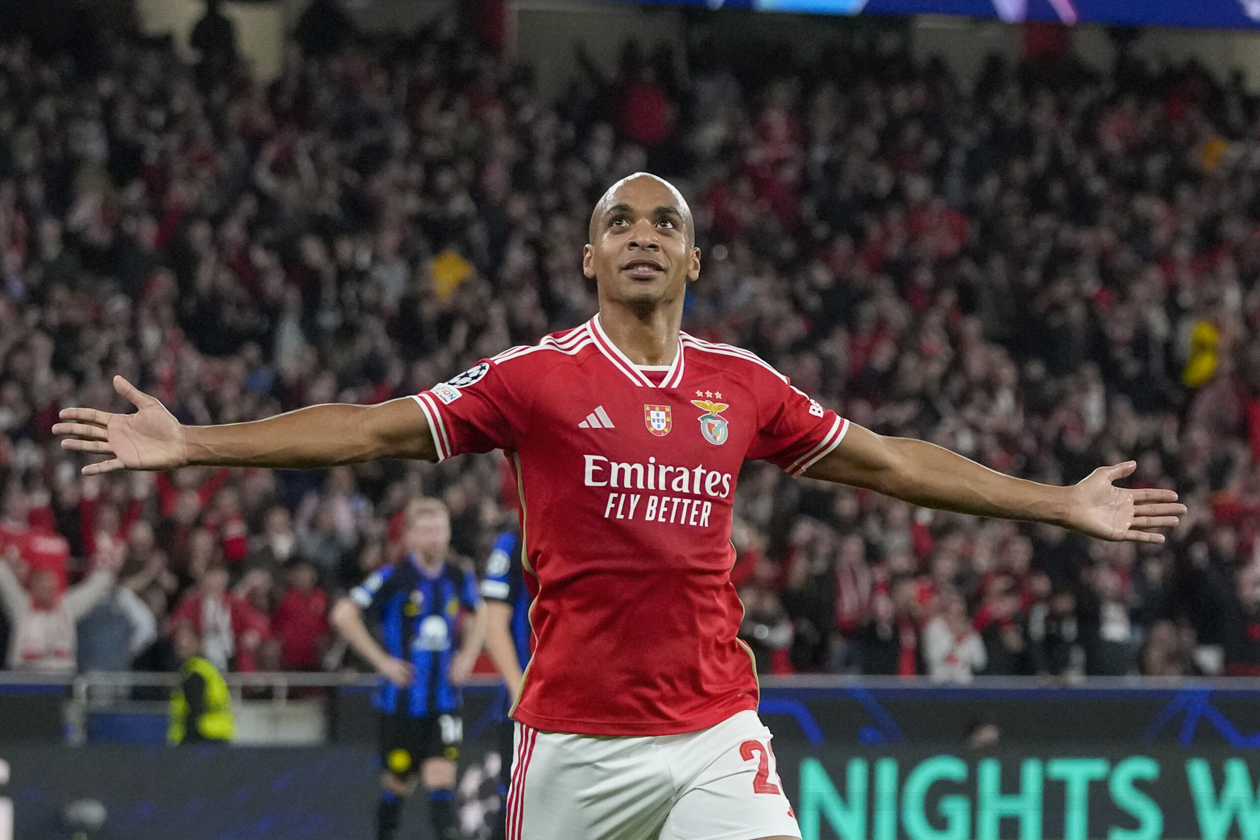 Benfica's Joao Mario celebrates after he scored his side's third goal during the Champions League group D soccer match between SL Benfica and Inter Milano at the Luz stadium in Lisbon, Wednesday, Nov. 29, 2023. (AP Photo/Armando Franca
