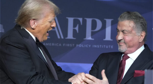 FILE - President-elect Donald Trump greets actor Sylvester Stallone during an America First Policy Institute gala at his Mar-a-Lago estate on Nov. 14, 2024, in Palm Beach, Fla. (AP Photo/Alex Brandon, File)