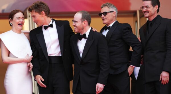 Emma Stone, from left, Austin Butler, director Ari Aster, Joaquin Phoenix and Pedro Pascal pose for photographers upon arrival at the premiere of the film 'Eddington' at the 78th international film festival, Cannes, southern France, Friday, May 16, 2025. (Photo by Scott A Garfitt/Invision/AP) France Cannes 2025 Eddington Red Carpet