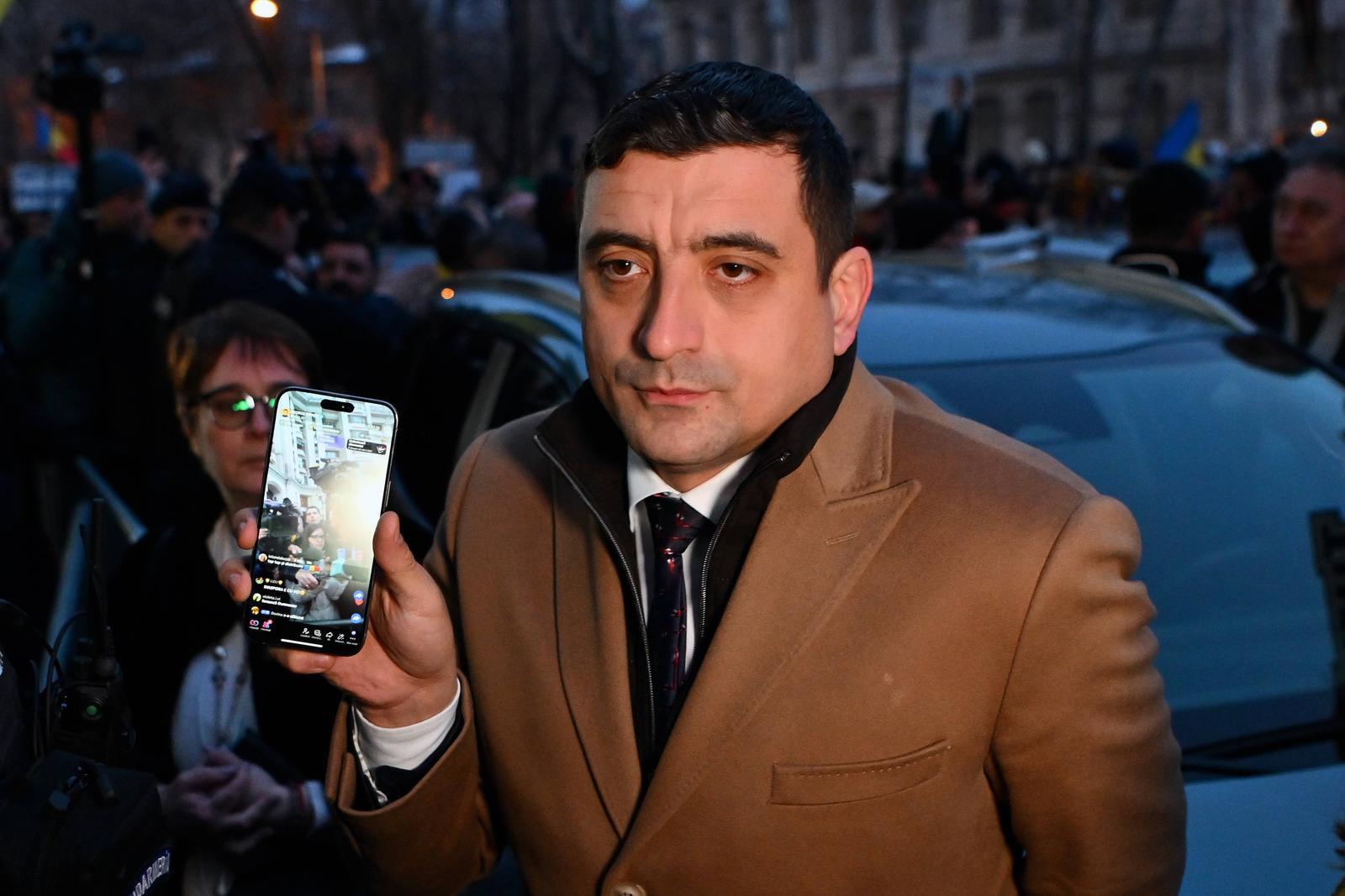 CALIN GEORGESCU-ROMANIA-POLITICS-JUSTICE-VOTE George Simion, leader of the right wing Alliance for Unity of the Romanians AUR reacts after Calin Georgescu was stopped in traffic and taken in for questioning, outside the General Prosecutor s Office, in Bucharest, Romania, Wednesday, Feb. 26, 2025. Calin Georgescu is the winner of Romania s first round of presidential election, annulled by the Constitutional Court. Alex Nicodim / Imago Images Bucharest ROMANIA Copyright: xAlexxNicodimx Photo: IMAGO/Alex Nicodim/IMAGOSTOCK&PEOPLE