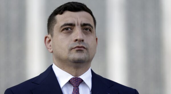 epa12073528 Ultra-nationalist party AUR leader George Simion attends a press conference with foreign media journalists held outside the Parliament Palace, on repeated presidential elections, first round, in Bucharest, Romania, 04 May 2025. Crin Antonescu is ranked second in the repeated presidential race. Approximately 18 million Romanian citizens are expected at the polling stations, according to the Permanent Electoral Authority (AEP).  EPA/ROBERT GHEMENT