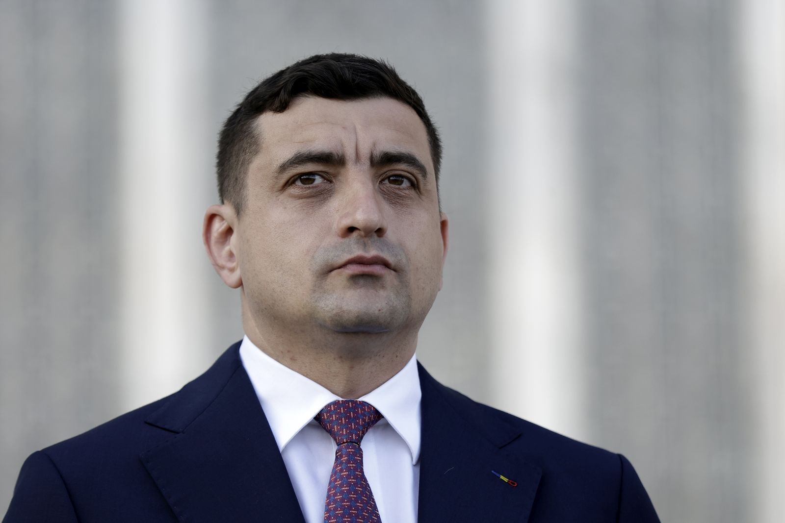 epa12073528 Ultra-nationalist party AUR leader George Simion attends a press conference with foreign media journalists held outside the Parliament Palace, on repeated presidential elections, first round, in Bucharest, Romania, 04 May 2025. Crin Antonescu is ranked second in the repeated presidential race. Approximately 18 million Romanian citizens are expected at the polling stations, according to the Permanent Electoral Authority (AEP).  EPA/ROBERT GHEMENT