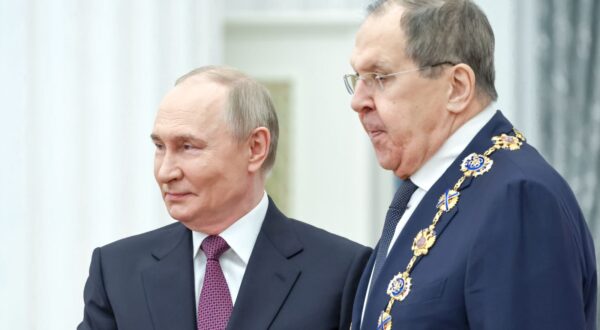 epa12125806 Russian President Vladimir Putin (L) awards Foreign Minister Sergey Lavrov with the Order of St. Andrew the Apostle the First-Called during a ceremony at the Kremlin Senate Palace in Moscow, Russia, 22 May 2025.  EPA/ALEXANDER KAZAKOV / SPUTNIK / KREMLIN POOL MANDATORY CREDIT