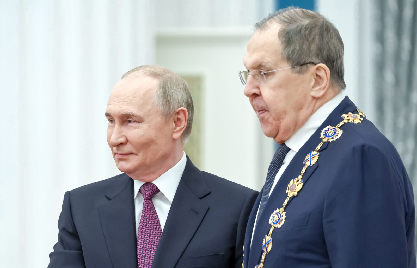 epa12125806 Russian President Vladimir Putin (L) awards Foreign Minister Sergey Lavrov with the Order of St. Andrew the Apostle the First-Called during a ceremony at the Kremlin Senate Palace in Moscow, Russia, 22 May 2025.  EPA/ALEXANDER KAZAKOV / SPUTNIK / KREMLIN POOL MANDATORY CREDIT
