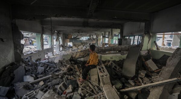 epa12136568 An internally displaced Palestinian boy sits at the destroyed building of Al Jerjawi school following Israeli airstrike in Al Daraj neighborhood in Gaza City on 26 May 2025. According to the Palestinian Health Ministry in Gaza over 30 Palestinians were killed in the airstrike in the early hours of the morning. More than 53,900 Palestinians have been killed in the Gaza Strip, according to the Palestinian Ministry of Health, since Israel launched a military campaign in the strip in response to a cross-border attack led by the Palestinian militant group Hamas on 07 October 2023, in which about 1,200 Israelis were killed and more than 250 taken hostage.  EPA/MOHAMMED SABER