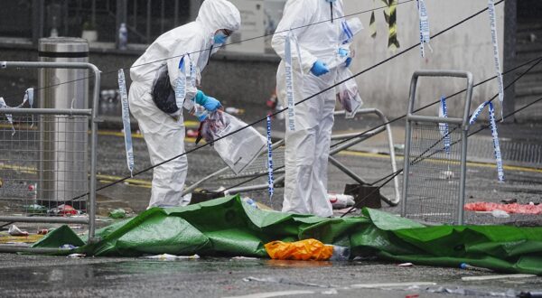 Forensic officers at the scene in Water Street near the Liver Building in Liverpool after a 53-year-old white British man was arrested when a car ploughed into a crowd of people during Liverpool FC's Premier League victory parade. Picture date: Tuesday May 27, 2025. Photo: Peter Byrne/PRESS ASSOCIATION